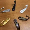 Accesorios de Ferretería de Aleación de Zinc, Gancho Negro para Ropa, Gancho Plano Individual Oculto para Baño, Perchero, Gancho Metálico para Ropa, Venta Directa del Fabricante