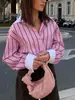 Camisa versátil de moda casual vintage al por mayor de comercio exterior europeo y americano con puños a rayas y colores contrastantes