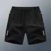 Verão Finos Modernos Marca Seda de Gelo Secagem Rápida Calças de Cinco Pontos Masculinas Esportivas Casuais Shorts Masculinos Largos Respiráveis Calças de Praia Masculinas Grandes