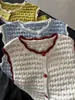 Chaleco de encaje a cuadros de punto hueco retro estilo japonés con botones para mujer, chaqueta suéter sin mangas que reduce la edad para otoño