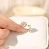 Anillo para mujer micro-incrustado giratorio circonita temperamento temperamento frío Han Bai diamante completo redondo geométrico anillo joyería al por mayor