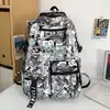 Mochila Escolar 2026 Estilo Nuevo Mochila con Graffiti de Cómics para Niños de Primaria, Mochila de Nylon de Gran Capacidad de Moda