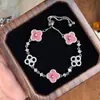 Exquisito Pulsera Extraíble con Incrustaciones de Diamantes, Brillante Imitación de Concha Rosa Natural, Trébol de Cuatro Hojas Hueco de la Suerte para Mujeres, Joyería de Mano de Lujo Ligero de Nicho