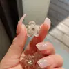 Nuevo clip para flequillo de camelia ins para mujer, tamaño pequeño para la frente, clip lateral para mechones rotos, clip de red, horquilla, accesorios para el cabello