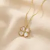 Collar de trébol de cuatro hojas con piedra ojo de gato de lujo ligero estilo coreano para mujer, nuevo colgante de lujo ligero, un regalo para el Día de San Valentín para tu novia