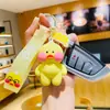 Llavero de pato de ácido hialurónico dududuck genuino y creativo colgante para mochila pato de celebridad de internet pareja de patos pequeño regalo al por mayor
