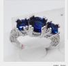Anillos de compromiso europeos y americanos con incrustaciones de circonitas, fabricantes de joyas al por mayor.