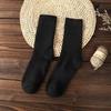 Calcetines de felpa para mujer de otoño e invierno engrosados más calcetines cálidos de terciopelo medias para hombre y mujer calcetines de piso al por mayor calcetines cálidos de toalla tubo