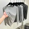 Camisa base de manga larga a rayas con cuello redondo, nueva y elegante, para mujer, a la moda y versátil, elástica, adelgazante y adecuada para el trabajo.