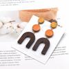 Aretes de Madera Retro de Estilo Europeo y Americano de Venta Caliente Transfronteriza, Colores Geométricos Contrastantes, Accesorios Exagerados para las Orejas, Estilo Largo Moderno al Por Mayor para Mujeres