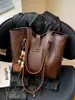 Bolso tote de moda retro de gran capacidad para mujer, nuevo estilo 2026, bolso de hombro versátil, bolso de axila, bolso para el trabajo