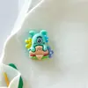 Feliz Estrella de Shanghái Bebé Dibujos Animados Pegamento Cremoso Accesorios Hebilla de Zapato Croc Material Resina Accesorios Joyería DIY Pasador de Pelo