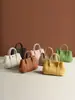 Design de Nicho Nova Bolsa Transversal de Couro Genuíno Transfronteiriça para Mulheres Couro Bovino de Camada Superior Premium Mini Portátil Bolsa de Jardim