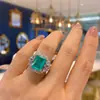 Europa y Estados Unidos popular anillo de tesoro de color simulación joyería de temperamento anillo de apertura ajustable retro piedra principal 10*12