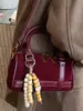 Bolso de Mano Boston Estilo Coreano Estampado de Leopardo Nicho para Mujer Verano 2025 Nuevo Bolso de Hombro Cruzado Retro Bolso Almohada