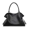 Bolsa tejida de gran capacidad para mujer, nuevo modelo 2026, bolso de hombro de nicho de alta gama, bolsa de mano casual de moda