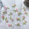 Joyería para uñas Tulipán de alta calidad permeable al hielo diseño de nicho aretes material luminoso para usar en la uña parche francés para uñas