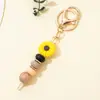 Popular Llavero de Silicona con Cuentas Cruzadas de Margarita Cadena para Bolso de Mujer Colgante de Girasol Accesorios Pequeños DIY