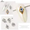 Accesorios para uñas, diamantes de imitación con forma de diamante y base plana, lentejuelas para uñas de aleación plateada, diamantes de imitación para decoración de uñas en stock, venta directa de fábrica, iridiscente