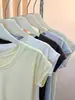 Camiseta de Manga Corta con Cuello en U Estilo Coreano para Mujer, Nuevo Top Versátil de Moda Ajustado para el Verano 2026 con Mangas Volantes Juveniles