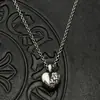 Collar Colgante de Corazón Roto y Lápida de Plata Tailandesa Retro Tendencia Estilo Nicho Europeo y Americano Alto Gama Otoño e Invierno