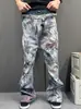 Jeans de Pierna Ancha Micro Acampanada de Hilo Grueso Lavados Desgastados con Estampado Completo Estilo Graffiti Retro Americano 2026 para Hombre
