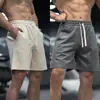 GYM ARM Marca de Moda Pantalones Cortos para Hombre Verano Nuevos Shorts Deportivos de Fitness Casuales Combinan con Todo Pantalones de Ante