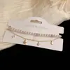Moda de Nicho, Versátil e Delicado Pulseira Estrela de Corrente Dupla de Pérolas, Joia de Mão com Design Doce e Simples Personalizado Atacado