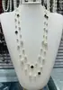 Colección Larga de Collares Superpuestos de Perlas Swarovski para Mujer, Estilo Lujo Ligero, Cadena Versátil para Suéter con un Toque de Alta Gama, Venta al por Mayor Otoño e Invierno