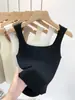 Camiseta de tirantes corta de punto versátil, color sólido, práctica, con escote cuadrado, entallada y que ajusta la cintura, en Negro Talla Única y Blanco
