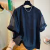 Camiseta Feminina com Textura de Acetato Estilo Chinês Verão 2026 Nova Blusa Curta de Manga Curta Emagrecedora Solta com Design Patchwork
