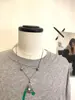 Collar Largo con Colgante de Agujero de Viento Escarchado para Mujer Nuevo Estilo Chino Diseño de Lujo Ligero Cadena de Suéter Deslizante de Gama Alta de Nicho