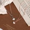 Collar creativo de concha para mujer con diseño de alta gama de plata esterlina S925, forma de corazón, fritilaria blanca, colgante minimalista de viento frío