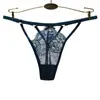Ropa interior sexy hueca transpirable de cintura baja para mujer europea y americana color sólido encaje divertido una con tanga
