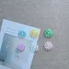 Nuevos accesorios de resina de margarita coloridos y transparentes de dibujos animados al por mayor para bricolaje, dijes para zapatos de pegamento cremoso, decoraciones para fundas de teléfono y zuecos