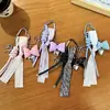 Pingentes de Bolsa Transfronteiriços, Decorações de Laço de Couro, Chaveiros de Coração, Correntes para Celular, Cordões, Pequenos Acessórios, Atacado de Comércio Exterior