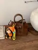 Bolsa Exclusiva de Nicho de Ombro Único para Mulheres 2026 Nova Vintage Versátil Bolsa Mãe-Filha Bolsa Transversal Bolsa de Mão Fashion Bolsa Saco