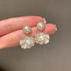 Diseño de nicho aretes de Camelia de Perla de alta gama temperamento femenino aretes de socialité aretes adelgazantes para rostro redondo aretes aretes
