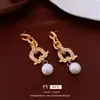 Pendientes de Borla de Perla con Herradura de Circonita Plateada Clavos de Oreja Exagerados Retro de Gama Alta Accesorios para Orejas de Nicho Lujo Ligero Venta al por Mayor Mujeres