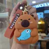 Bolsa de monedas popular de Capibara Llavero Cabeza de silicona Bolsa de almacenamiento para auriculares Bolso colgante Accesorios Regalos pequeños Al por mayor