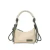 2026 Verão Novo Estiloso Individual Fashionável Nicho Chique Casual Textura Simples Ombro Único Transversal Portátil Bolsa Feminina