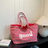 Bolsa de Tote Grande de Rayas Doble Cara con Letras Coreanas 2026 Mismo Estilo que las Celebridades de Internet Bolsa de Hombro Único Estilo Perezoso Bolso de Mujer Tela
