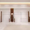 Estanterías de Exhibición para Tiendas de Ropa, Estantes de Pared para Tiendas de Ropa de Mujer, Percheros de Pie, Estanterías de Exhibición de Acero Inoxidable Color Nogal Imitación para Ropa Infantil