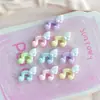 Mini Accesorios de Resina con Forma de Ala de Nota Musical Símbolos Musicales Pequeños Decoración para Funda de Teléfono Pasador Materiales de Decoración con Pegamento de Crema Hecho a Mano