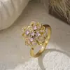Diseño de Nicho Europeo y Americano Anillo Abierto Giratorio con Forma de Trébol de Cuatro Hojas Microincrustado de Circonita Acero Inoxidable Collar de Flor para Mujer