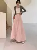 Falda blanca de estilo suave en línea A para mujer, nuevo modelo primavera/verano 2026, de cintura alta, adelgazante, con efecto de caída, falda larga de volantes