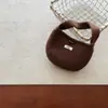 Bolsos Coreanos para Niños Qiunan Bolso de Mano Tejido Simple Color Sólido Hebilla de Cuerno Mini Bolso de Lana Bolso de Mano Venta al por Mayor