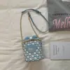 Bolso Cilíndrico con Lazo de Tablero de Ajedrez Fresco 2026 Nuevo Estilo Bolso Cruzado de Cadena Femenino Bolso de Hombro Casual Versátil