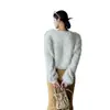 Colección de otoño/invierno 2026 estilo coreano transfronteriza: suéter de punto holgado, de manga larga, con cuello redondo y textura esponjosa para mujer