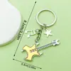 Diseño Creativo Plata Vintage Saxofón Cinta Musical Llavero Transfronterizo Más Vendido Colgante de Bolsa Pequeño Accesorio